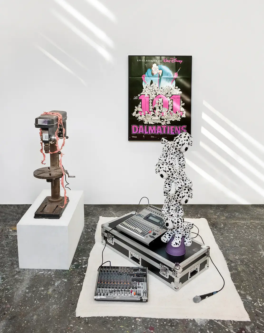 anything is rashomon  mixed media installation with 101 dalmatians movie poster plush toys audio equipment carlos charlie perez