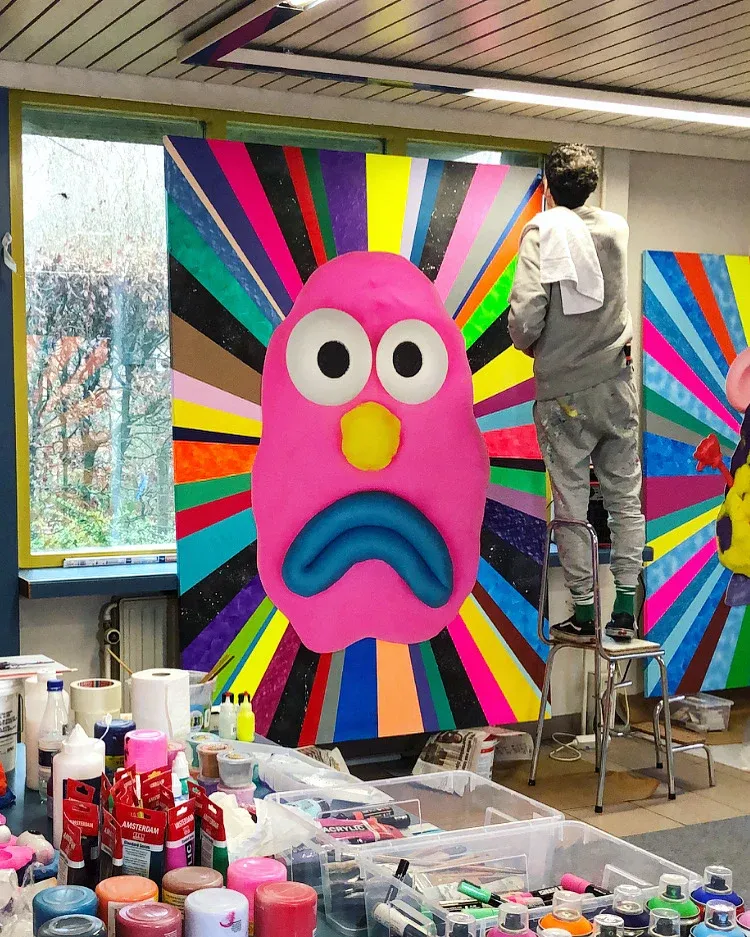 miguel delie, artist studio, working on a painting