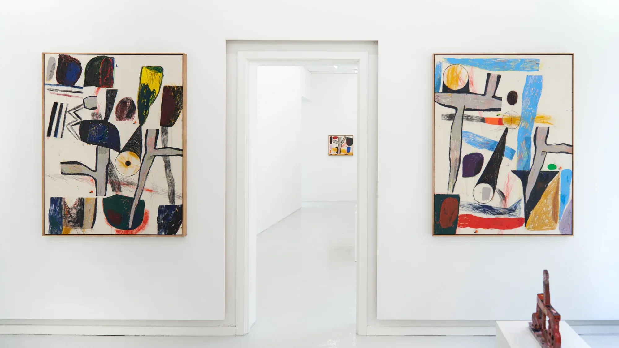 sune christiansen experimenting with pastels, acrylics, and oils on canvas in a sunlit studio