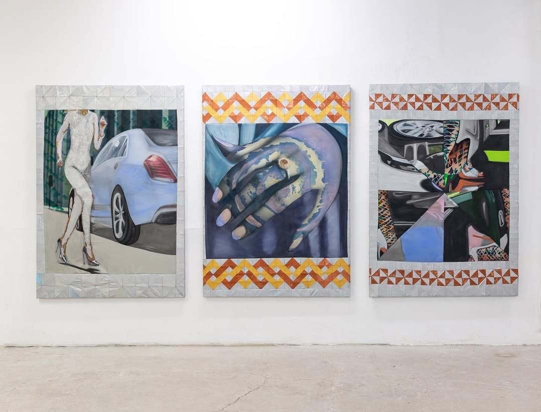 Installation view of Bety Krňanská’s solo show at Alkinois Gallery, featuring sculptural elements like car parts and textile-framed paintings in a raw white cube setting