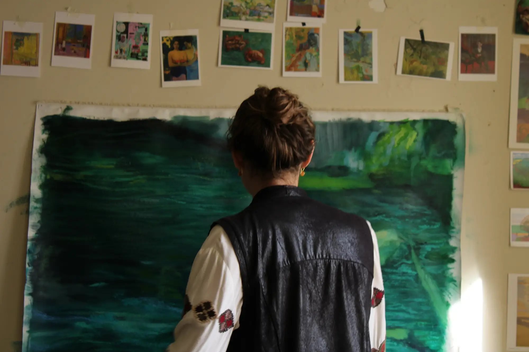 Large-scale forest-inspired canvas by Stefanie Pullin in progress on easel