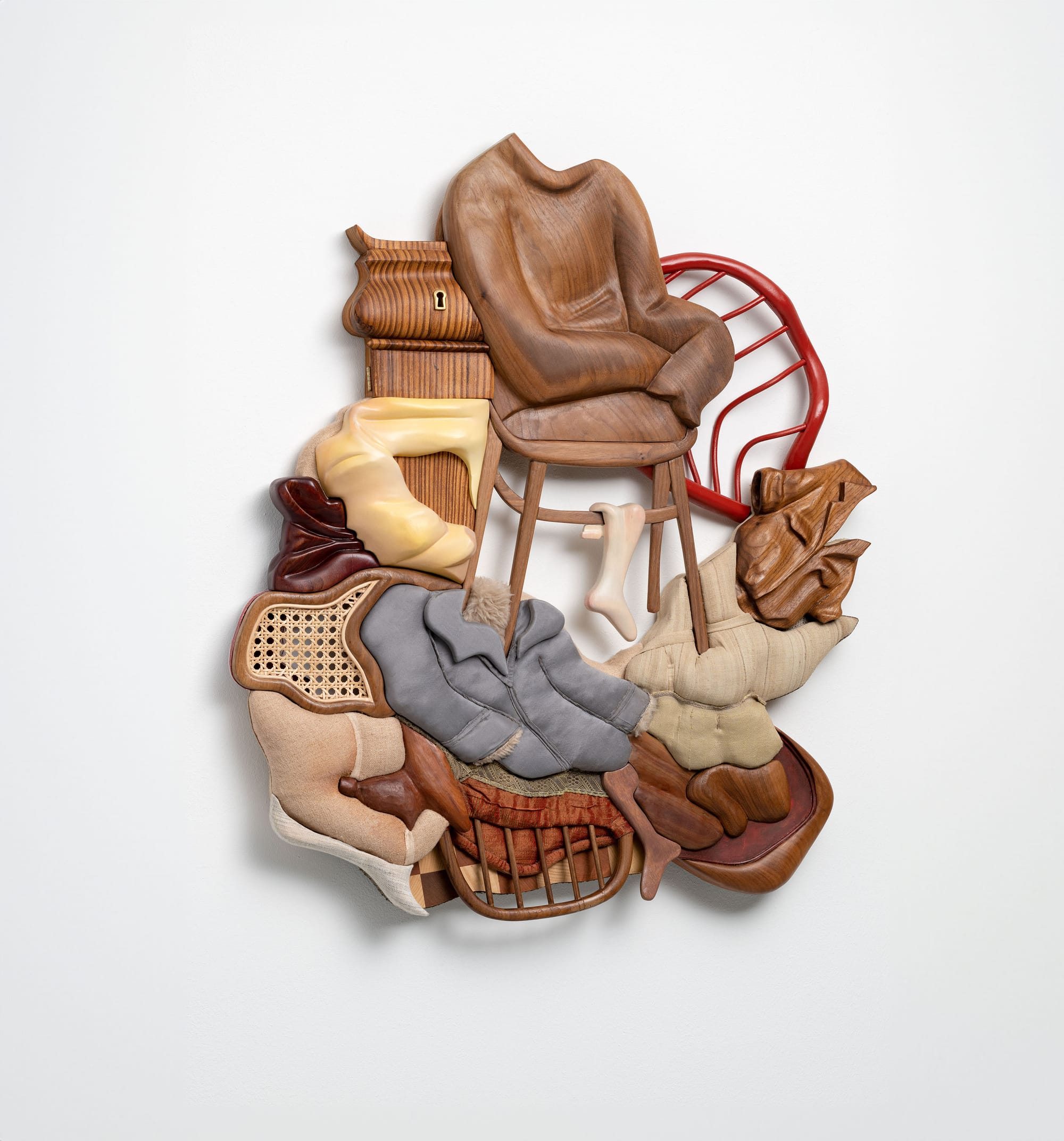 wooden wall sculpture of household items