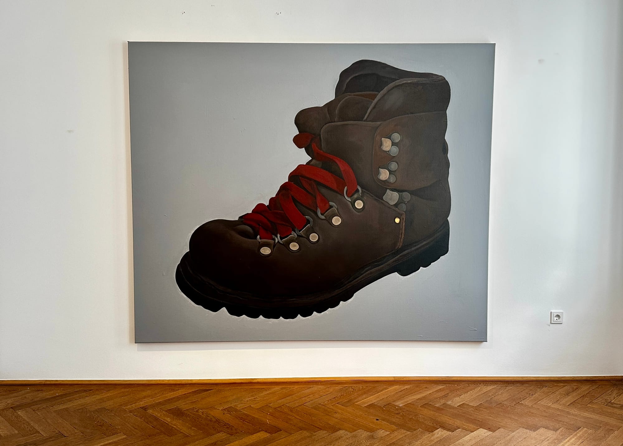 Large painting of a hiking boot from Tin Trohar’s exhibition “1996” at Klubhaus, Vienna.
