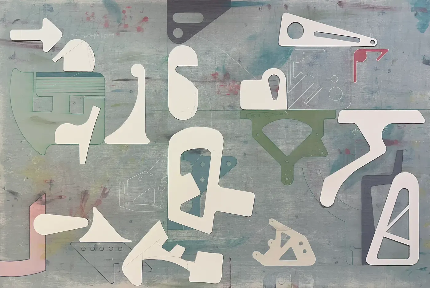Studio templates and cut shapes used by Chris Cassimatis to develop compositions and structural balance in his painting process, shown arranged across a large work surface. Image Courtesy of the Artist.