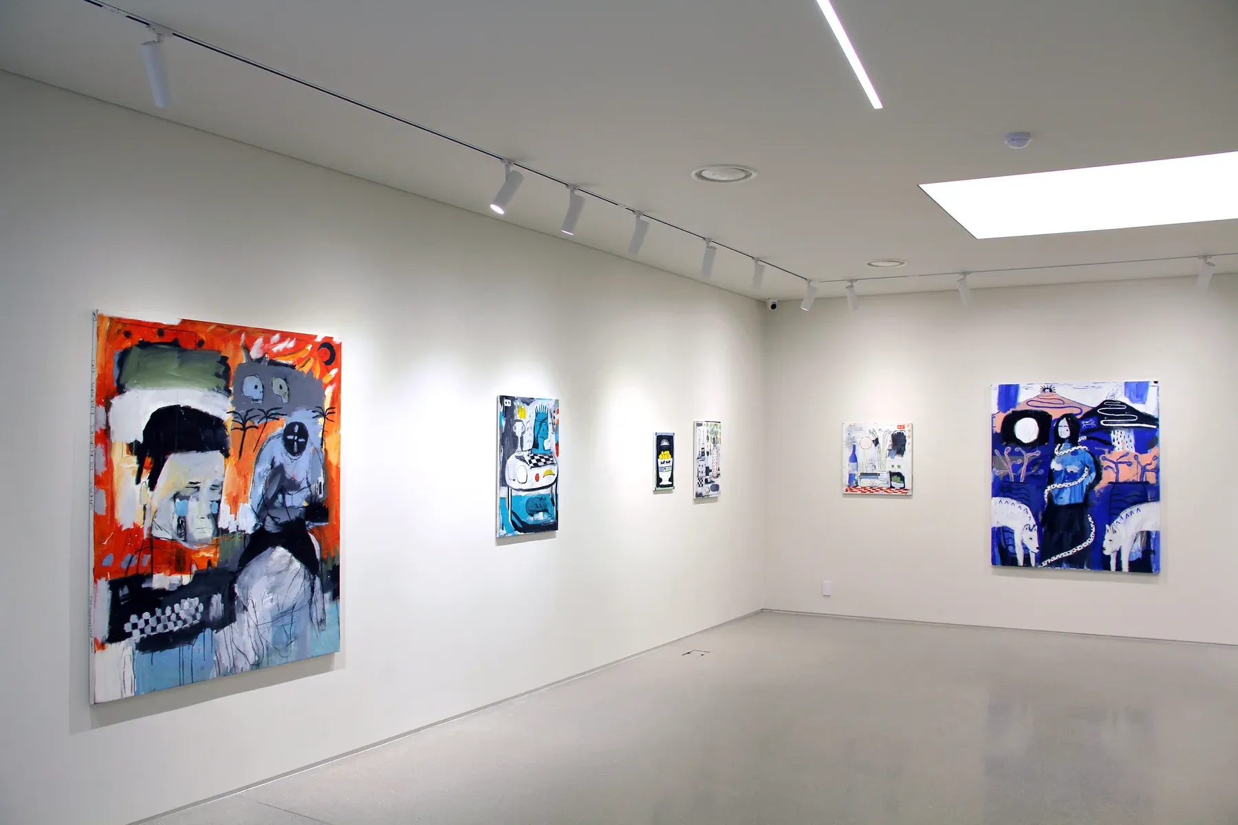 Gallery installation view showing several colourful paintings by Billy Bagilhole on white walls at K & L Museum in South Korea.