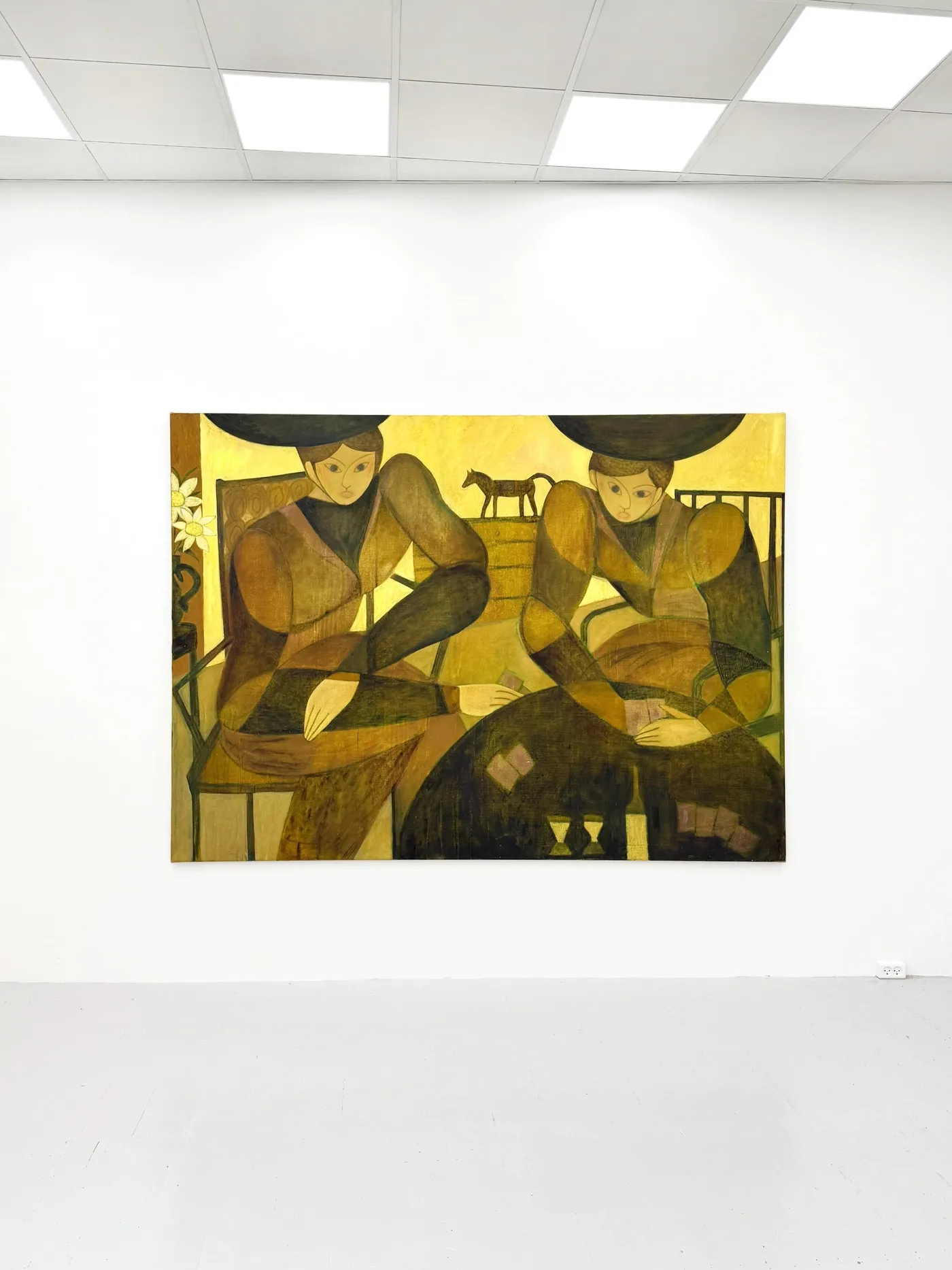 Large figurative painting by Bob Geerts titled Untitled (Two Figures), 2025, in ochre and brown tones showing two seated women with interlocking geometric forms, exhibited at HAGD Contemporary, Aalborg, Denmark.