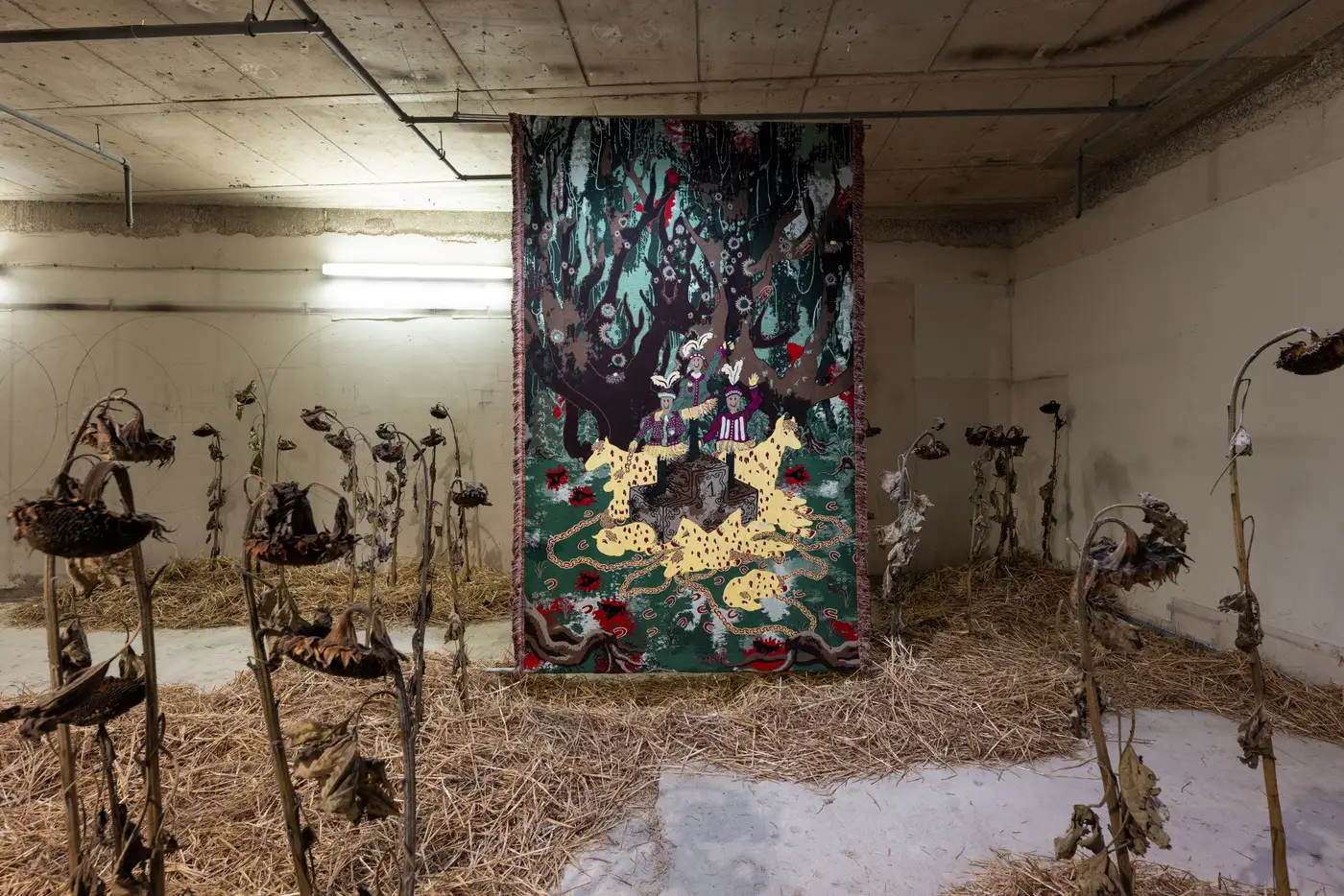 promising artist Olivia rode hvass showcase her new work as installation, jacquard tapestry with bleeding horses and entitled hunted during Luxembourg art week , hay, sunflowers and textile storytelling at its best