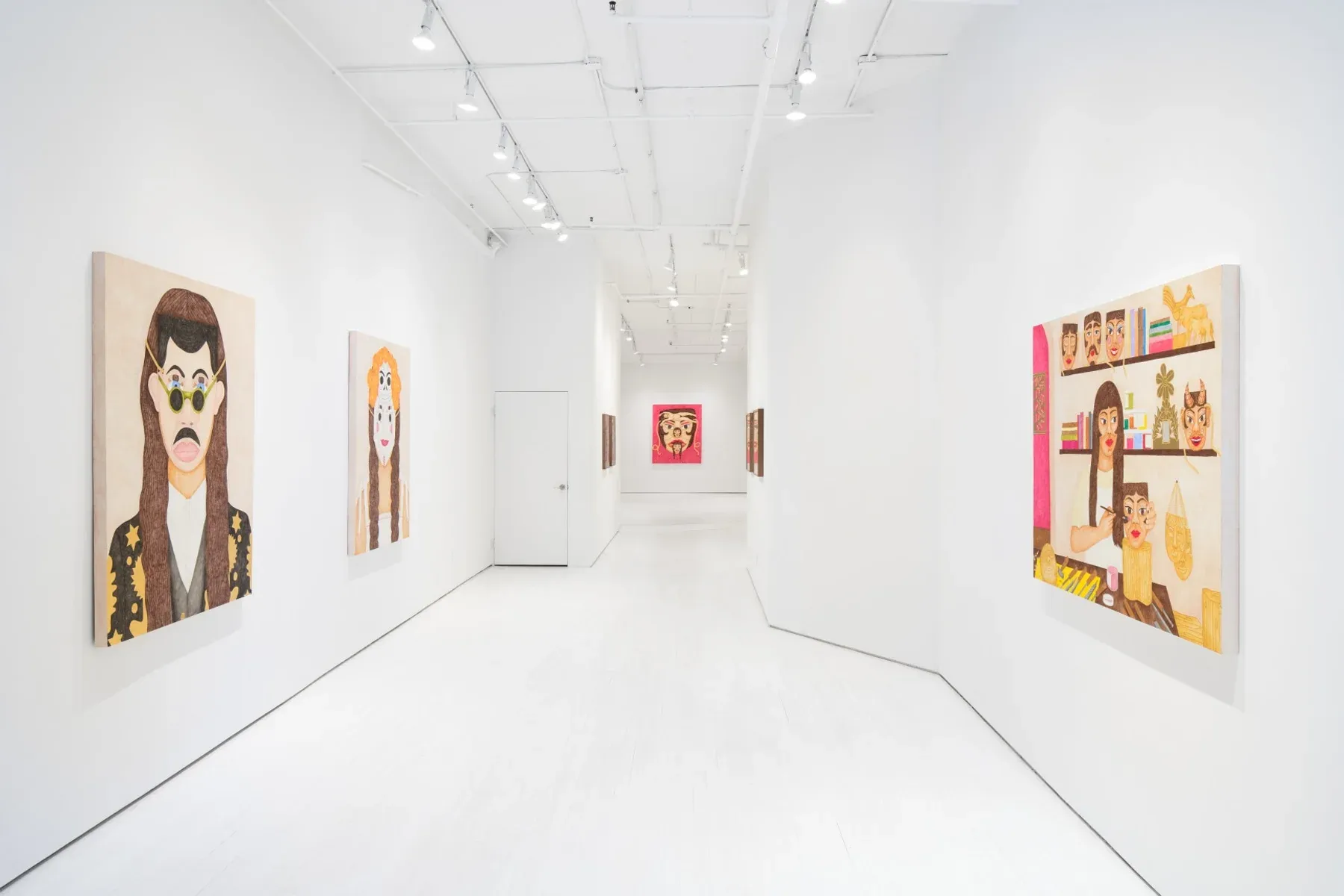 White gallery hallway filled with large mask-portrait paintings, each showing fragmented or repeated facial elements.