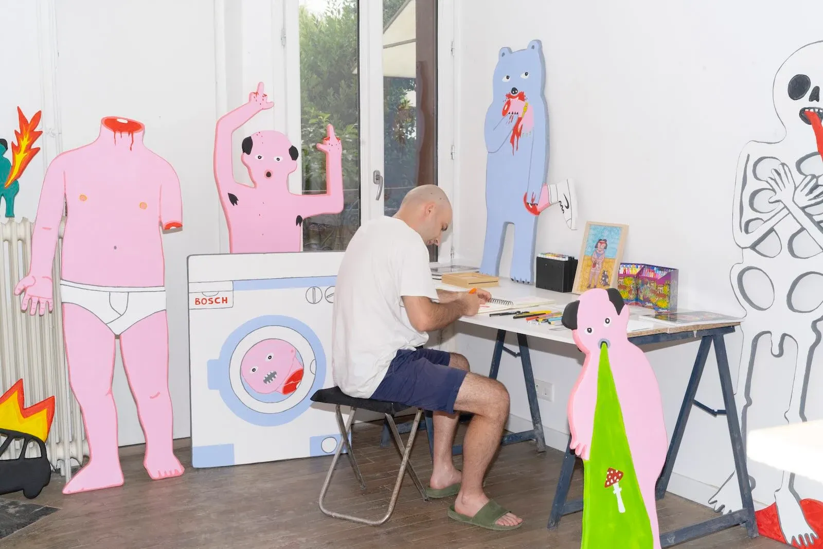 Ivan Volkov, artist in his studio, building a setup for an installation, artist practice 