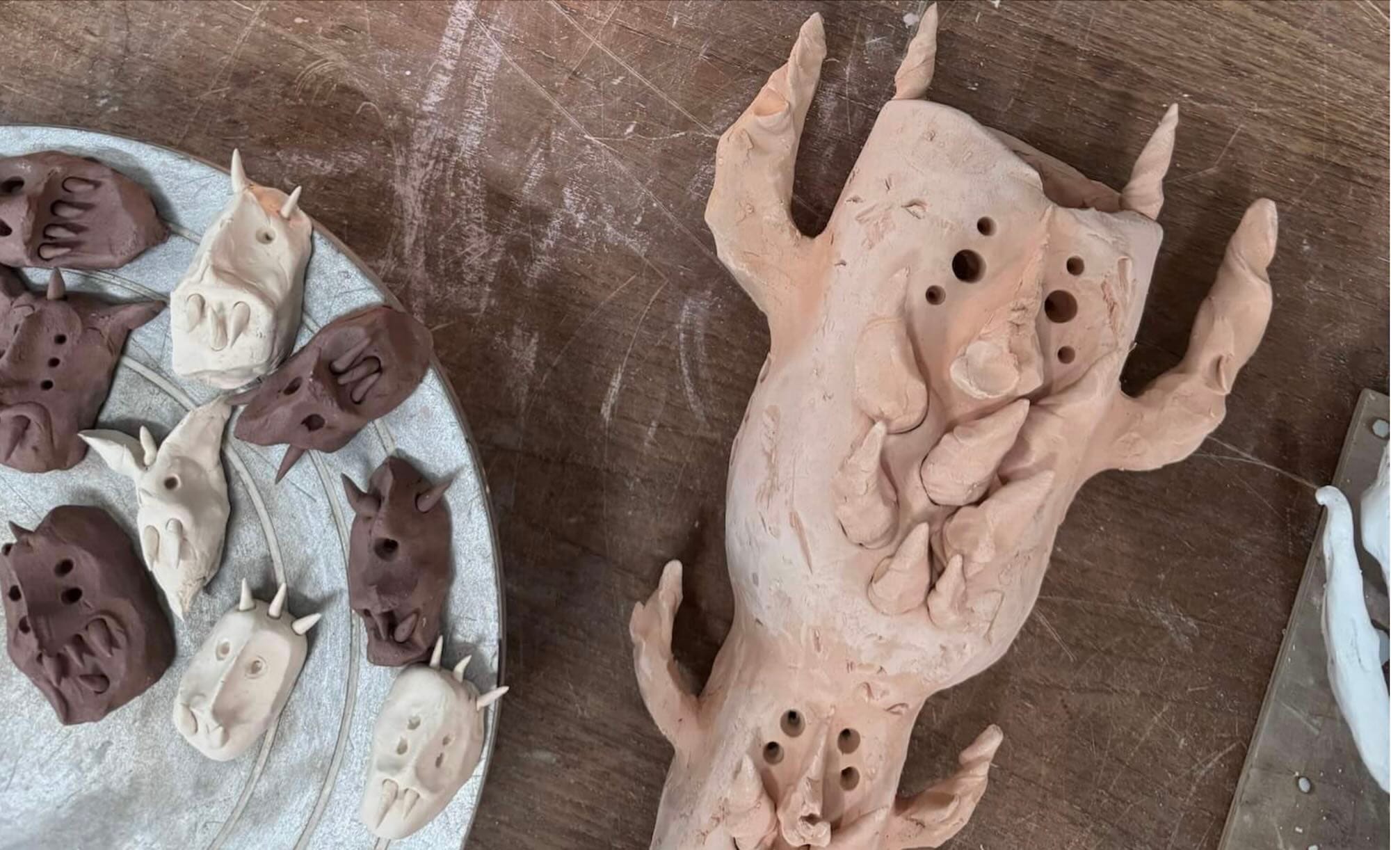 Michael Kærgaard in his studio with stone glazed works figurative and the making of Mother of Many at HAGD Contemporary