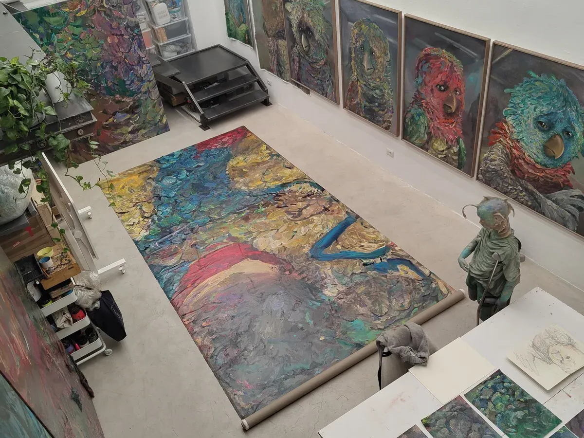 view from above studio artist with work in progress