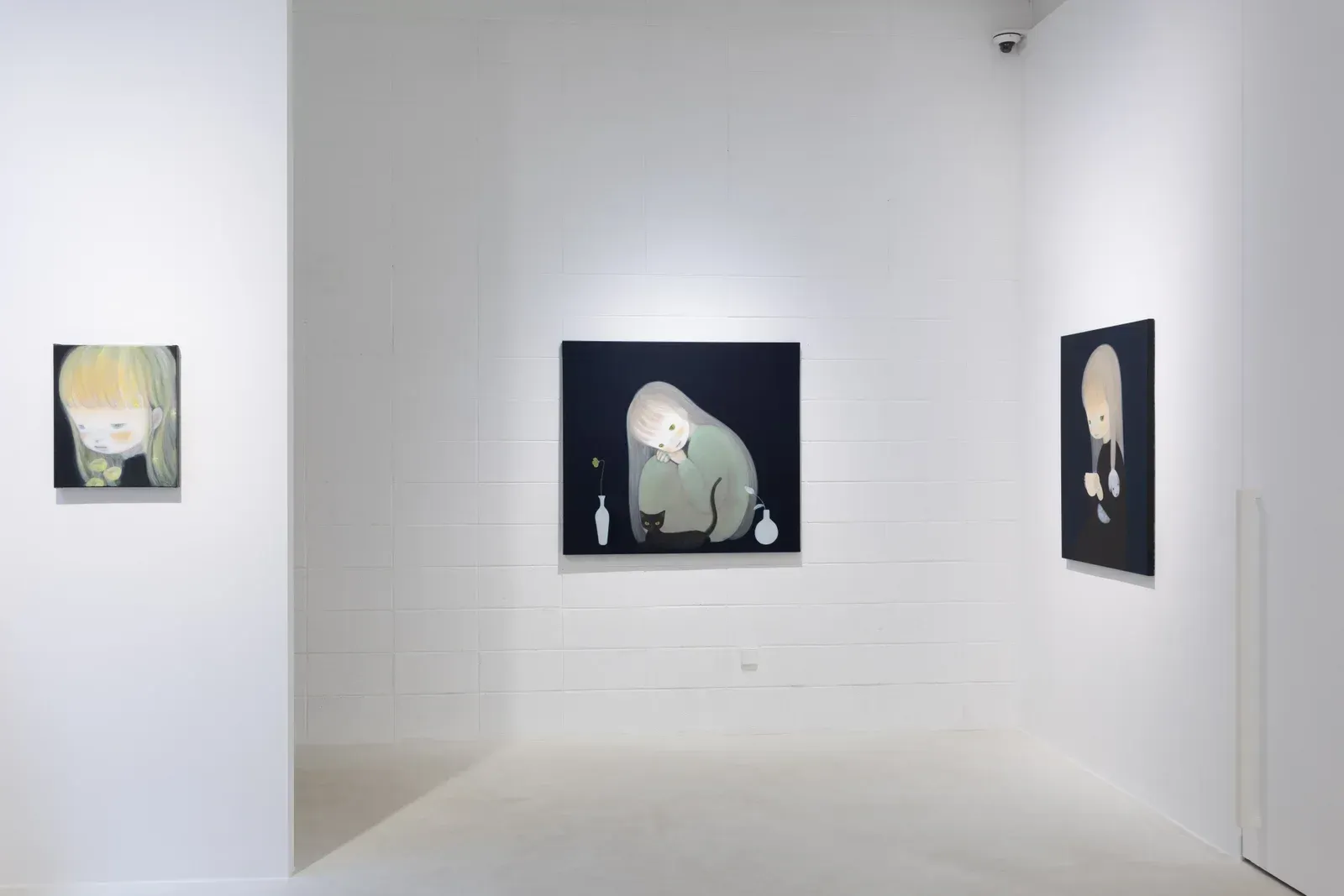 Ruo-Hsin Wu paints faceless figures suspended in pitch-black voids. Taiwan-based, technically luminous, emotionally weightless.