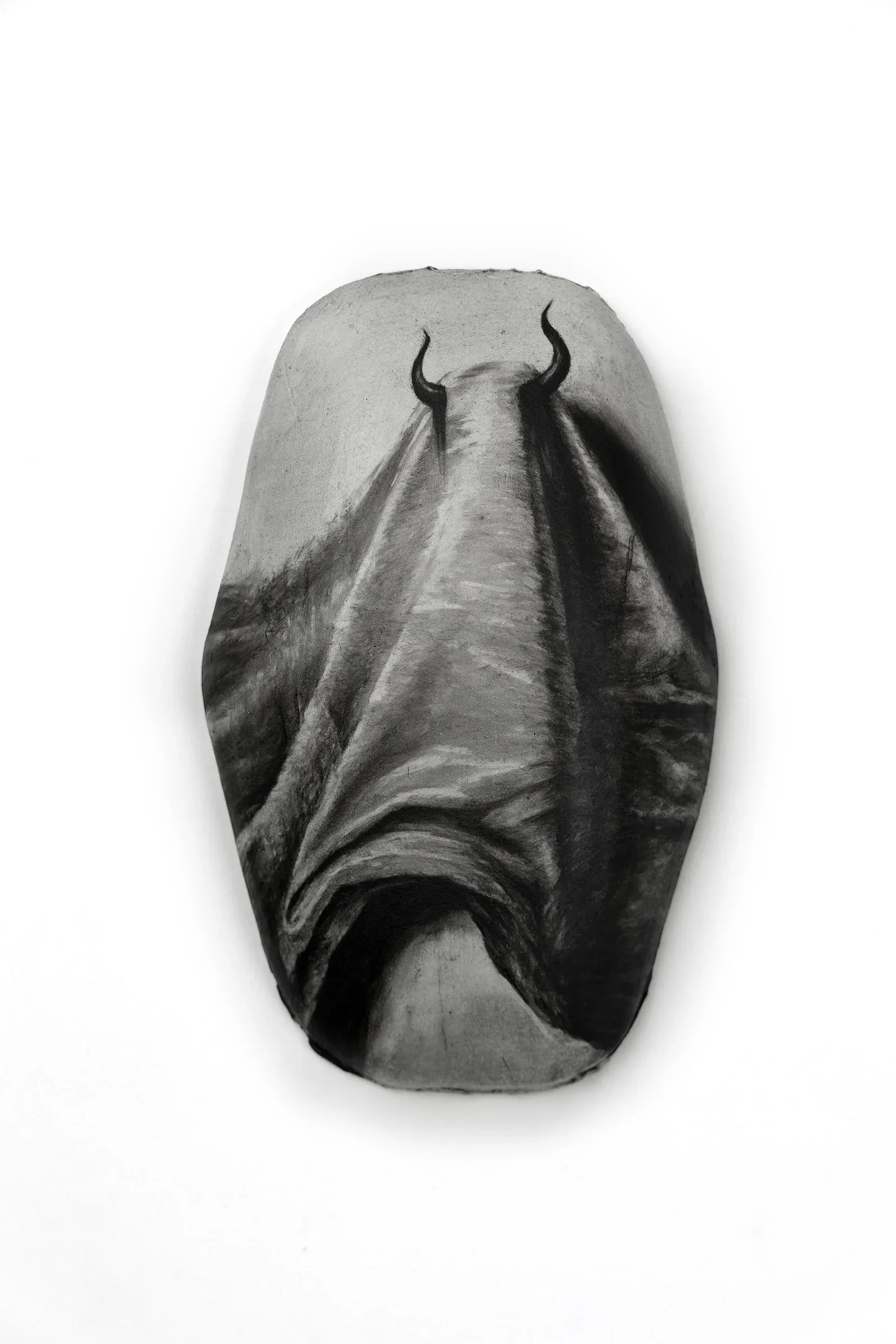 Bart Gielen: ‘The Devil in his Youth’ black and white on stone ware , horn and bull under a blanket 