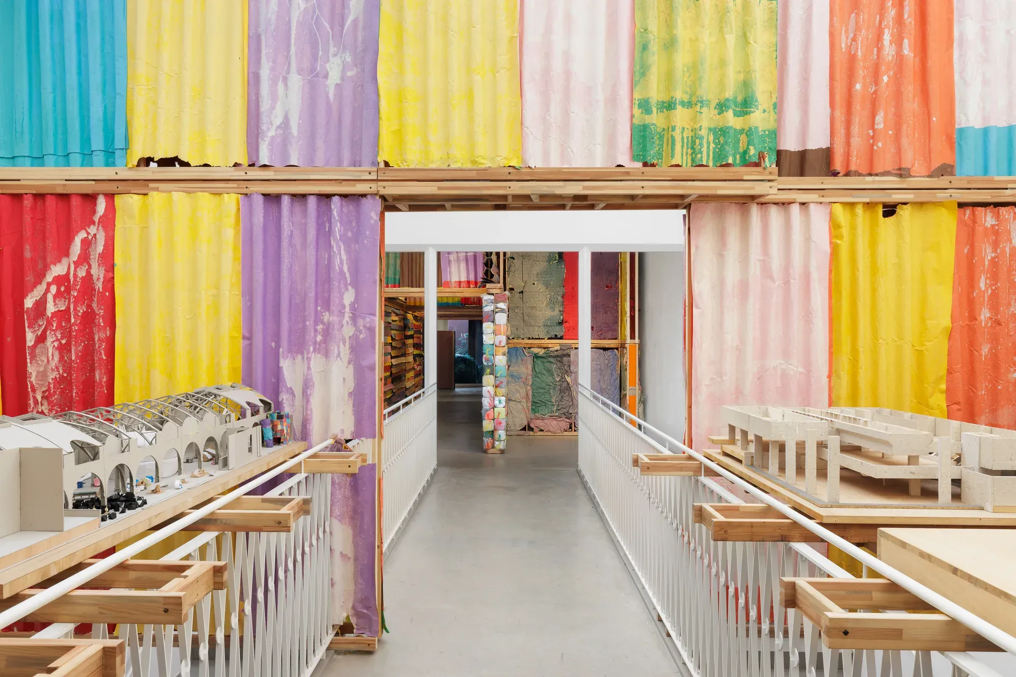michael Beutlers outstanding exhibition view colorful, textile and paper intervention
