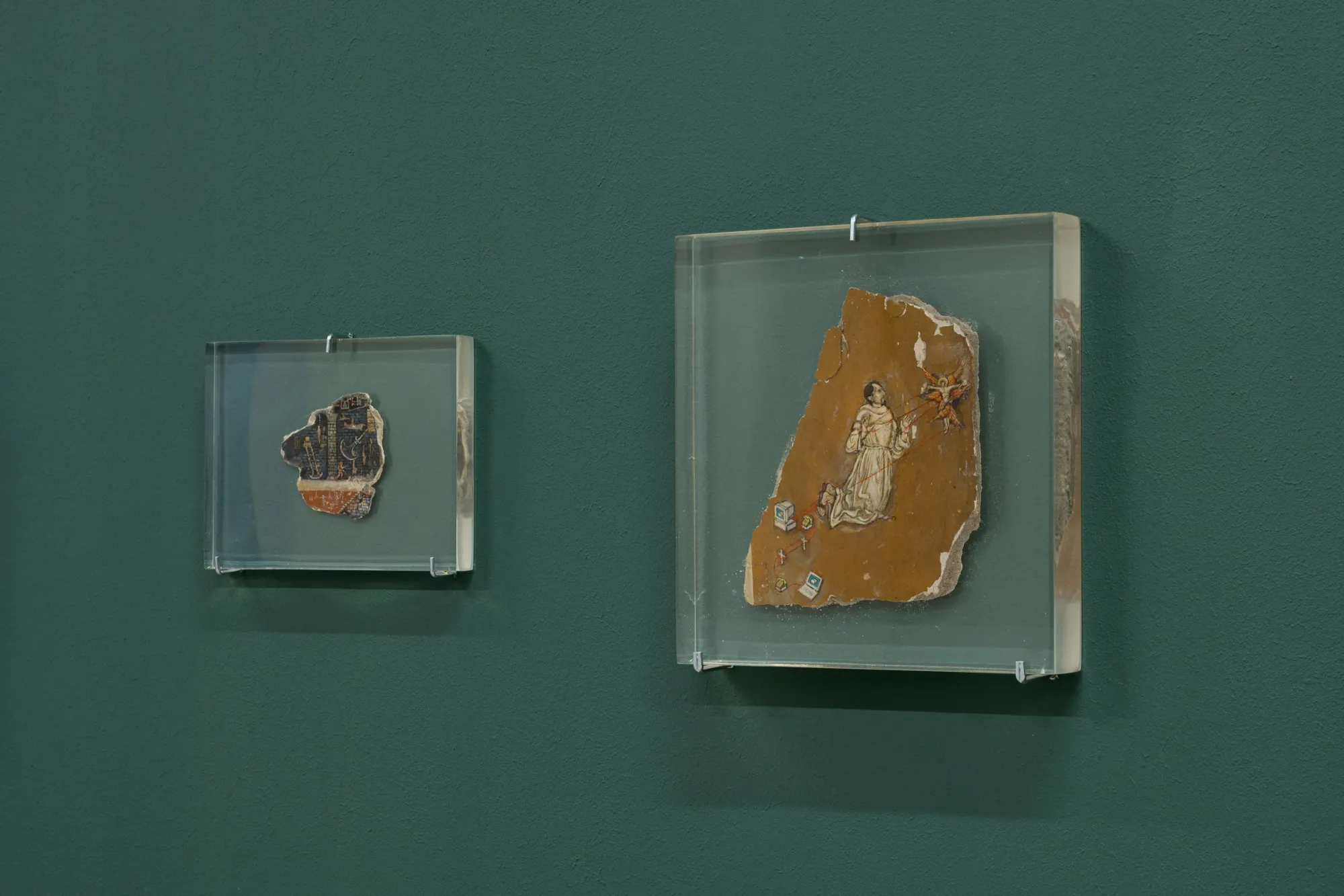 Nicolae Romanitan behind the glass painting Telegraph Gallery, Olomouc -&nbsp;Transylvanian Painting Today green walls