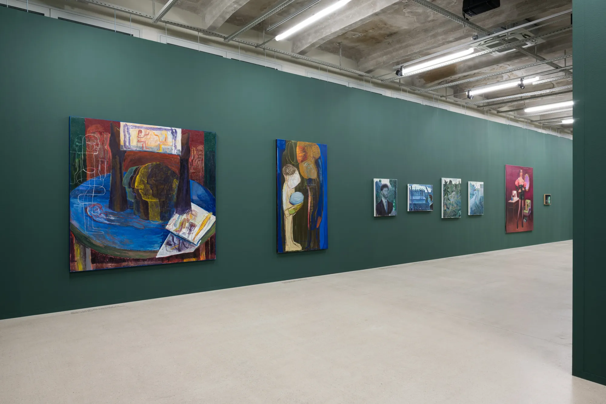 Tincuta Marin, David Farcas, Oana Farcas installation view large and small abstracted painting and figurative paintings across the wall green