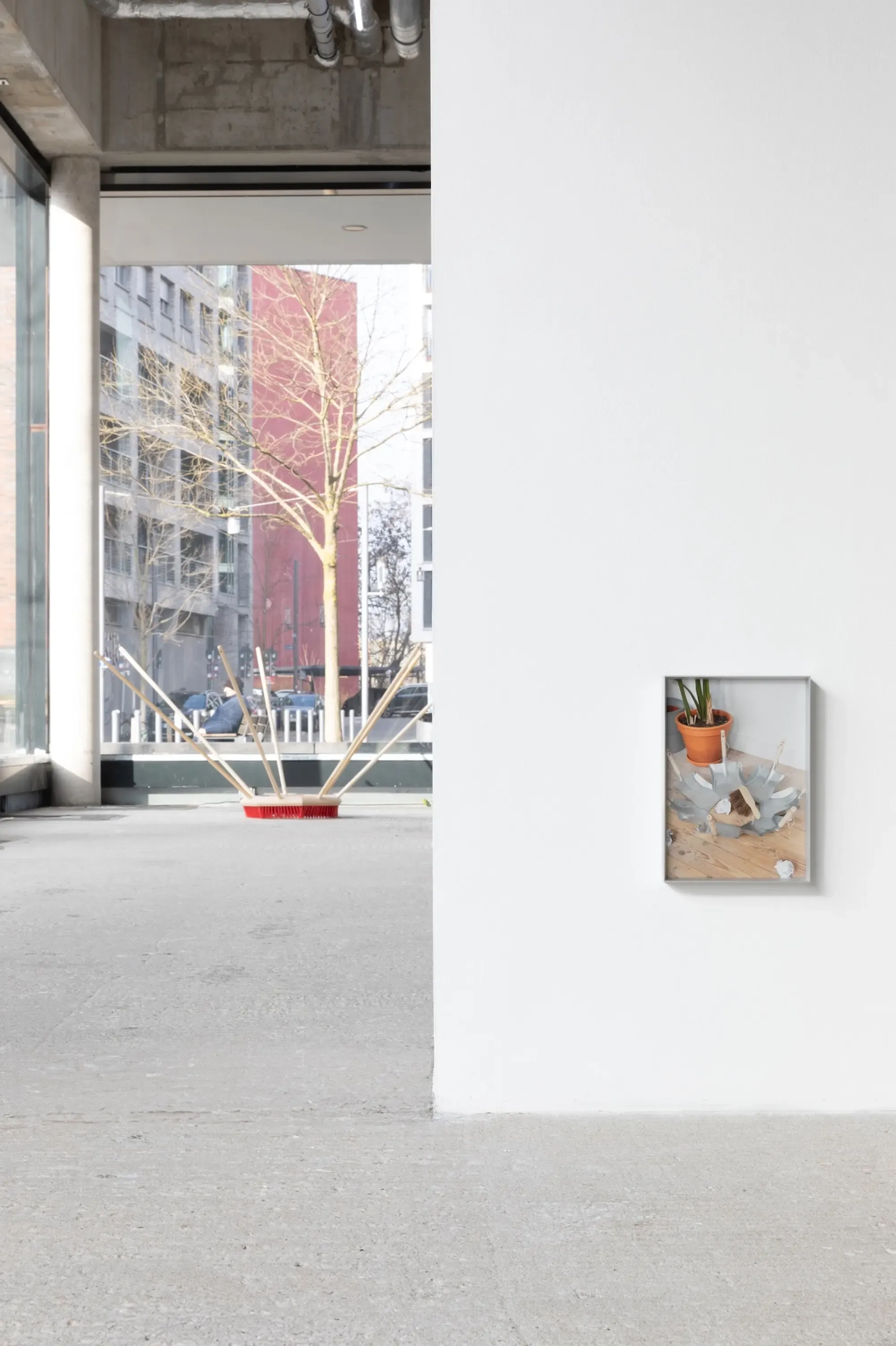 Willem de Haan, Installation view of Call Someone at ayayay Frankfurt showing  sculpture Surrounded I made from brushes and wooden handles.