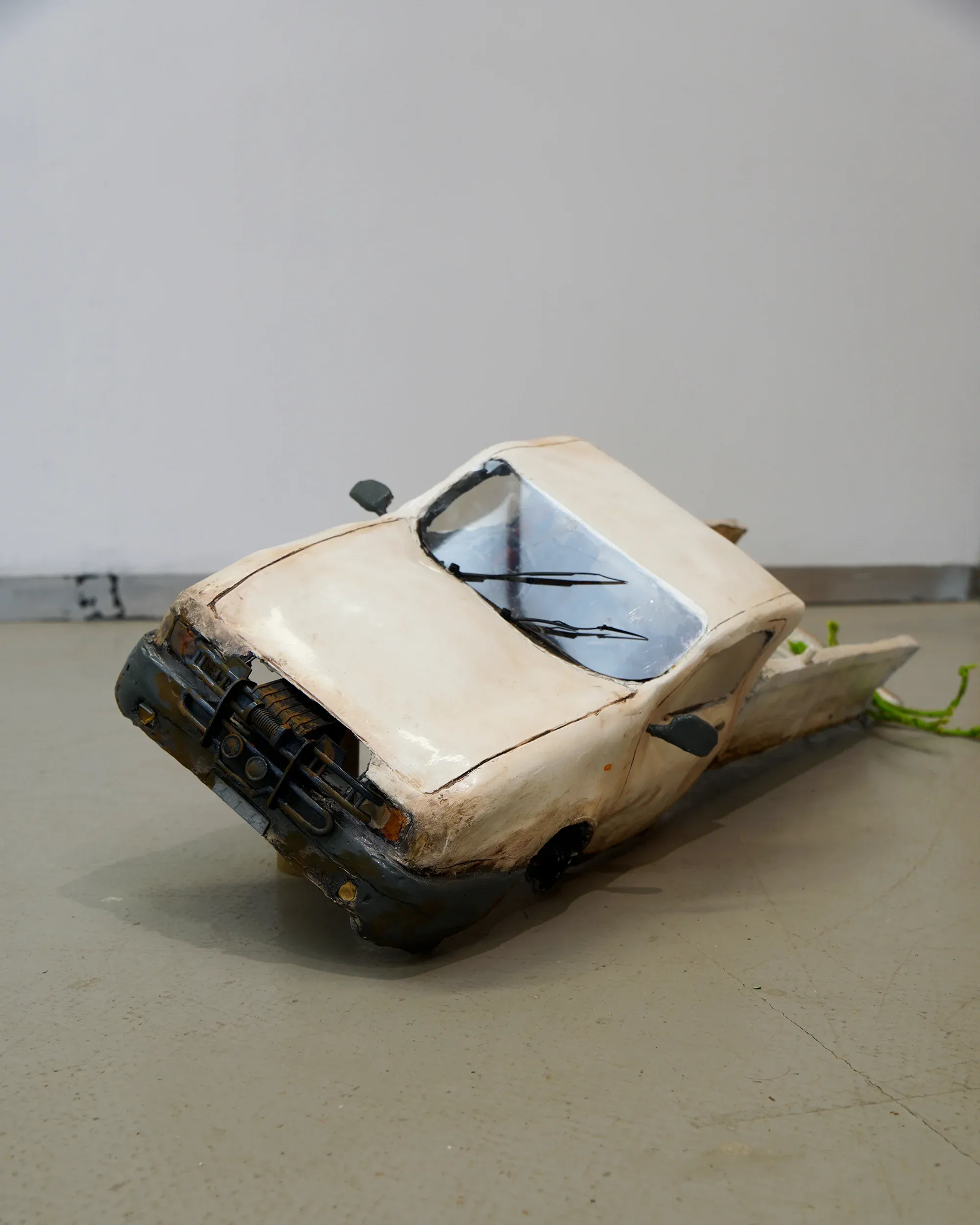 Yorgos Agrotes, artist, car , sculpture on the floor
