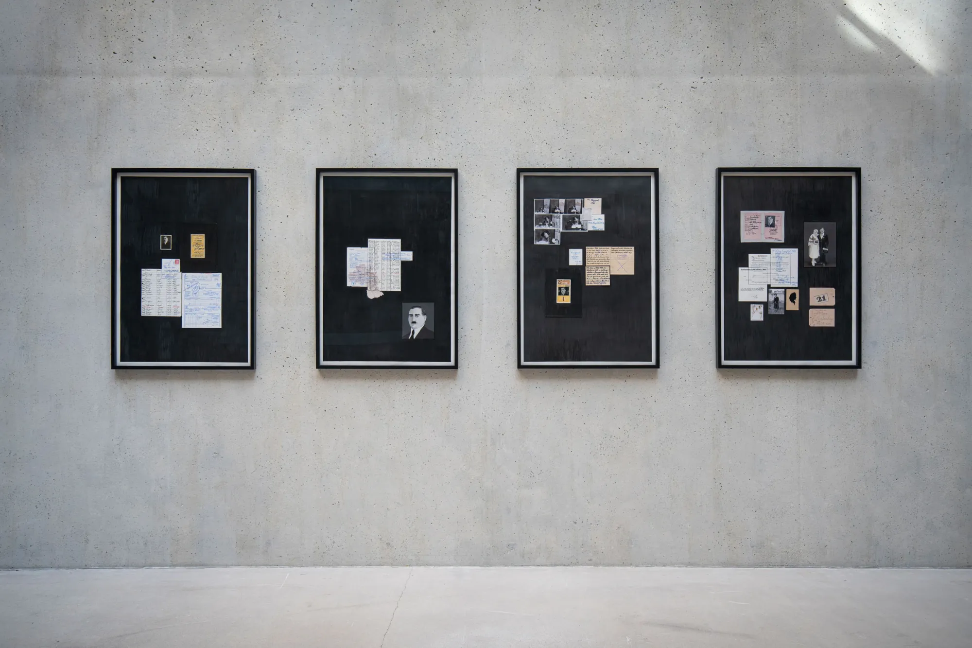 Ramesch Daha Mein Österreich exhibition view black walls installation TAXISPALAIS Innsbruck archive works