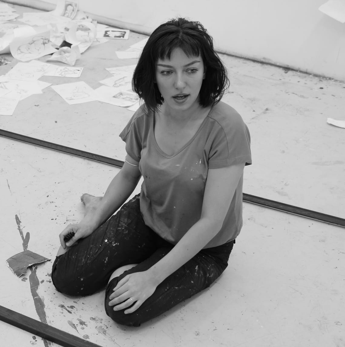 Maria Naidyonova in her studio sitting on the floor. Photo: Anastasia Kerner
