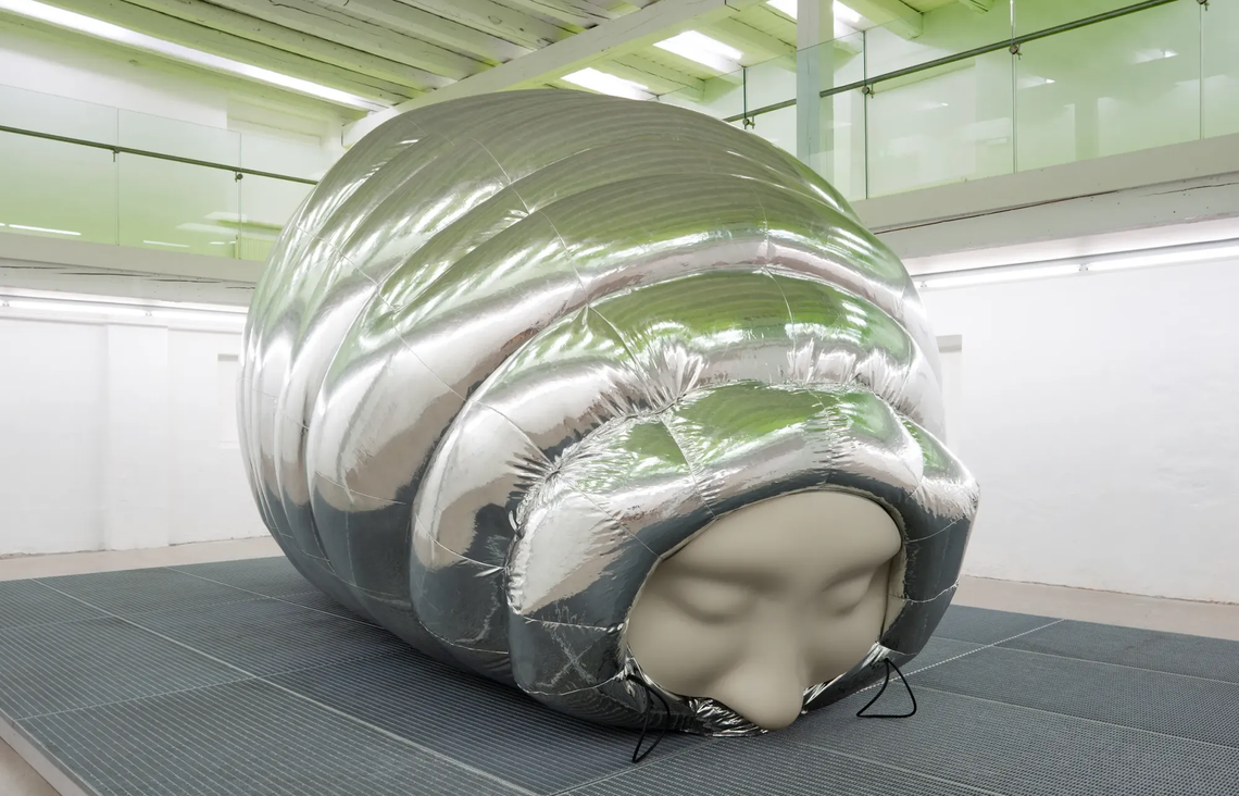 Stine Deja Micro Management Viborg Kunsthal 2026 inflatable silver sculpture human face cocoon installation contemporary art Denmark exhibition view
