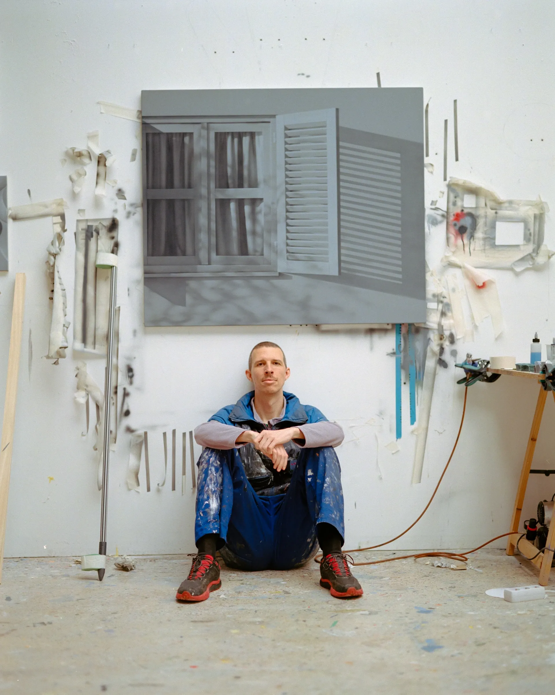 Artist Paul Riedmüller with contemporary paintings, header image for interview “Painting the Digital Hallucination” with Ernst Koslitsch, Catapult – The New Munchies Art Club