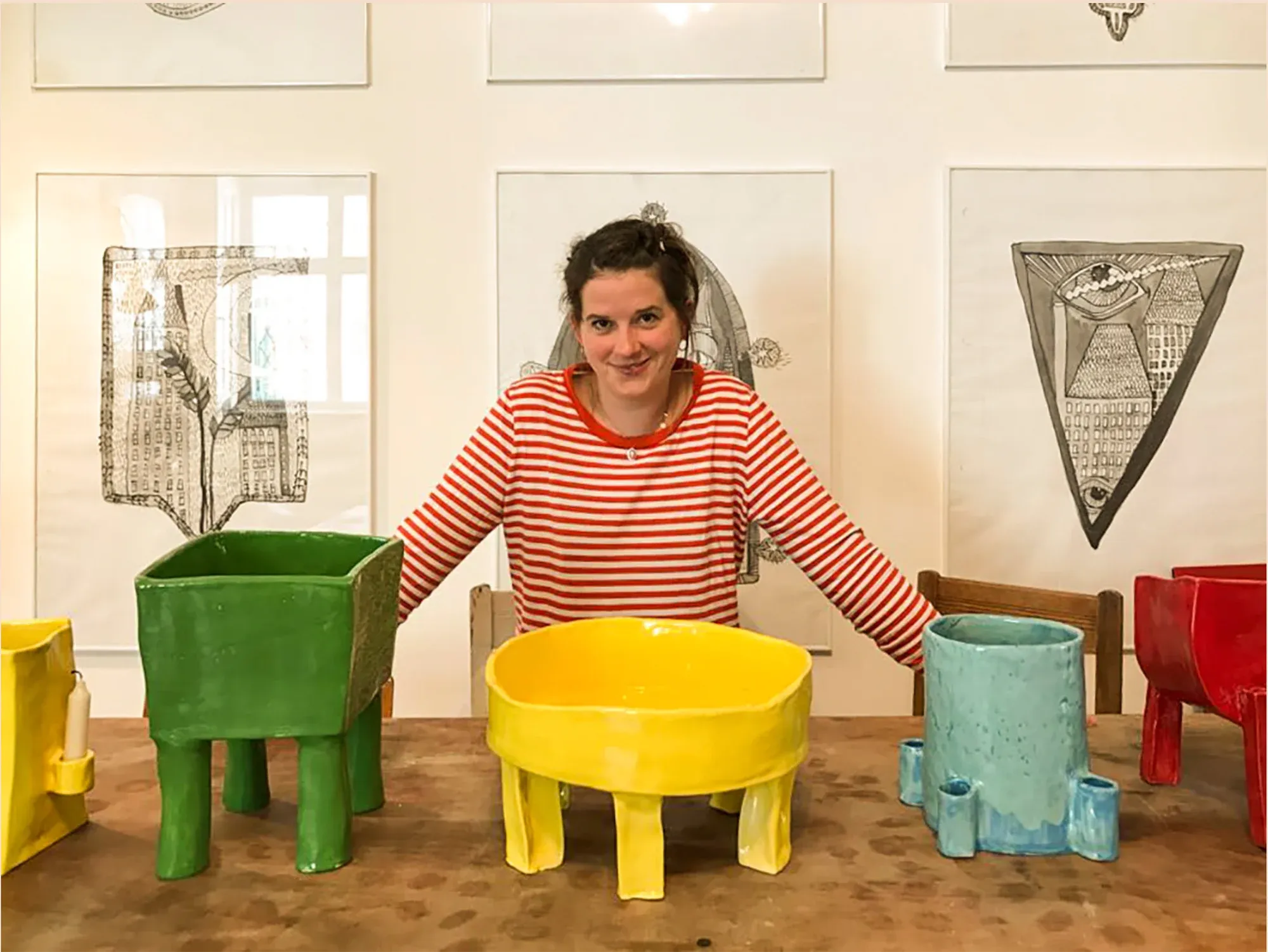 onka allmayer-beck in front of her colorful ceramics, promising artist vienna