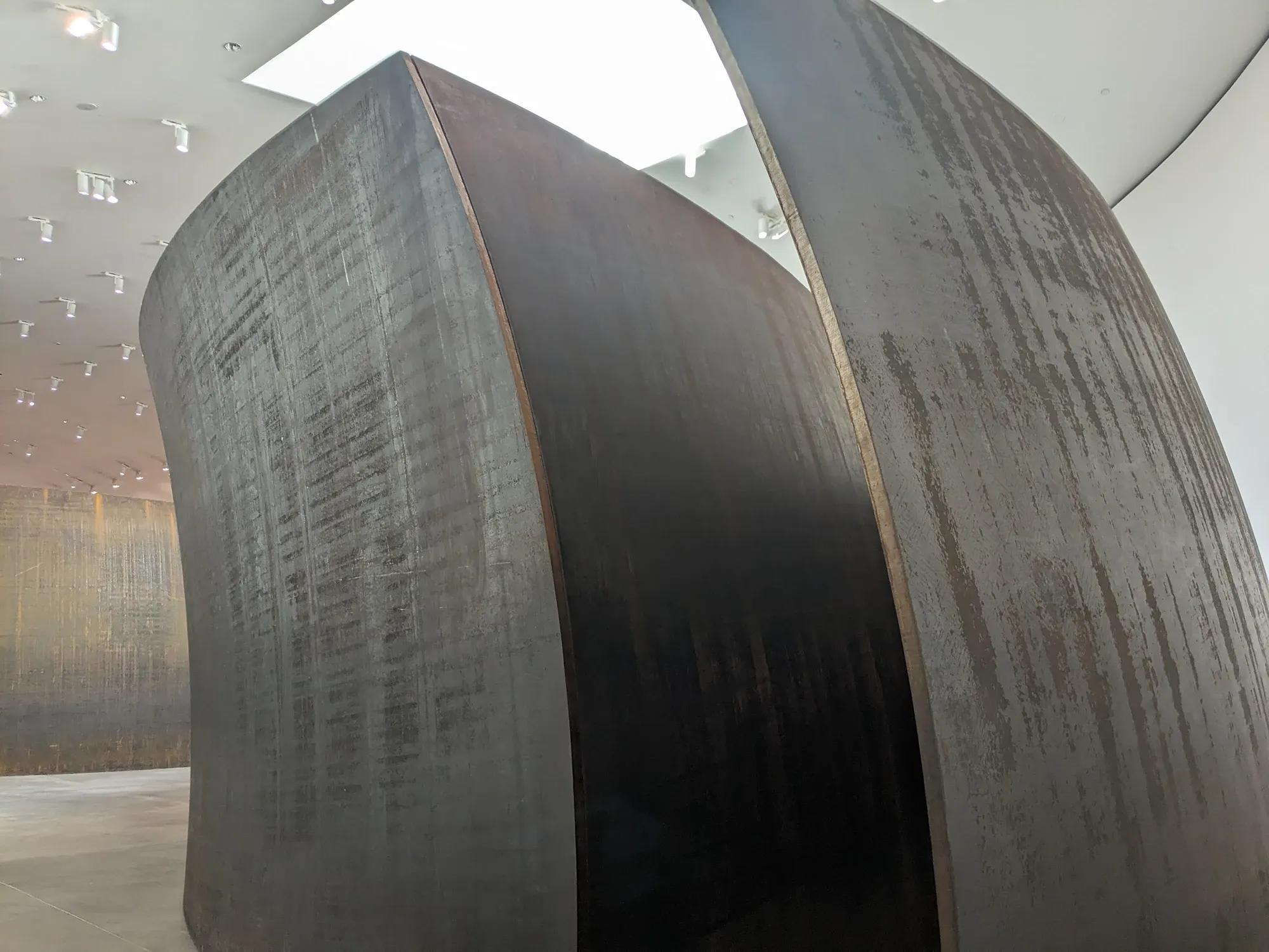 richard serra, contemporary artist profile with a work  Guggenheim museum bilbao steel sculpture ultra large