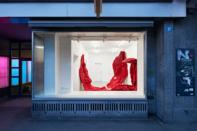 Soojin Kang red textile installation in gallery window at night, artist focus - catapult - artist in focus series about new faces in contemporary art