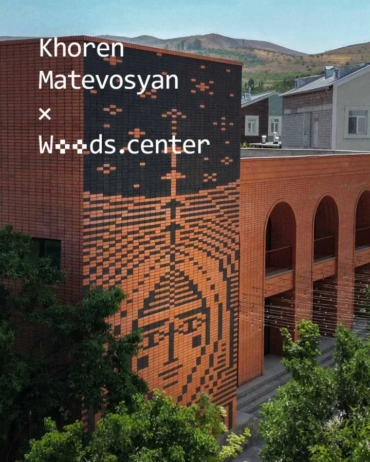 Facade view of Khoren Matevosyan’s “Chronicle of Motion” mural at Woods.center featuring a pixelated figure rendered in ceramic tiles.